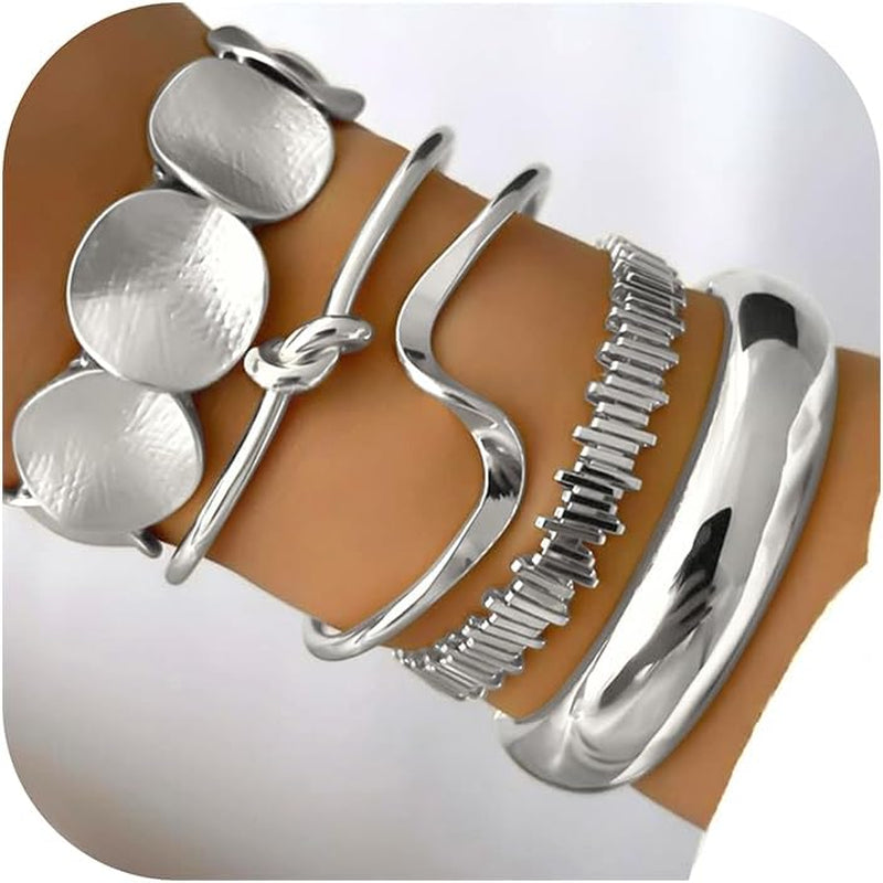 Chunky textured gold bangles in minimalist boho style