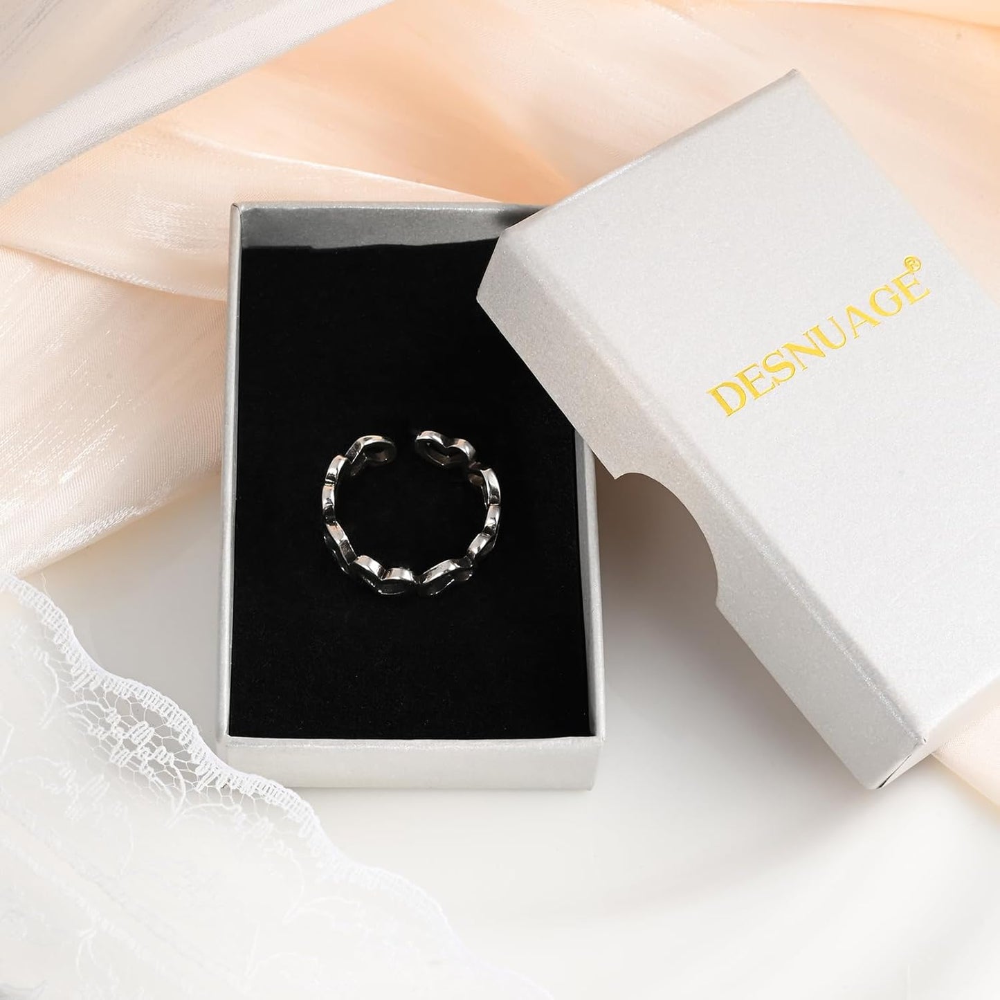 Silver heart ring styling ideas for women's everyday wear