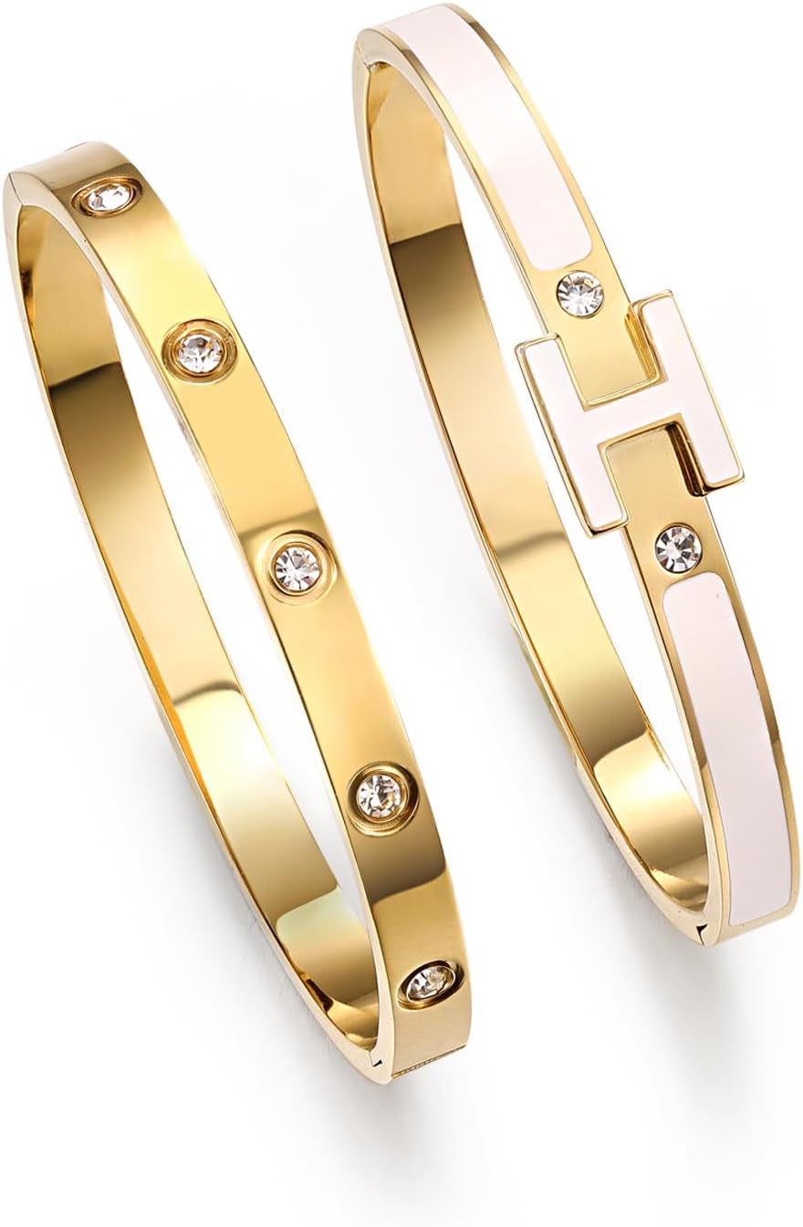 Multiple sizes of 14K gold plated love bangles arranged together