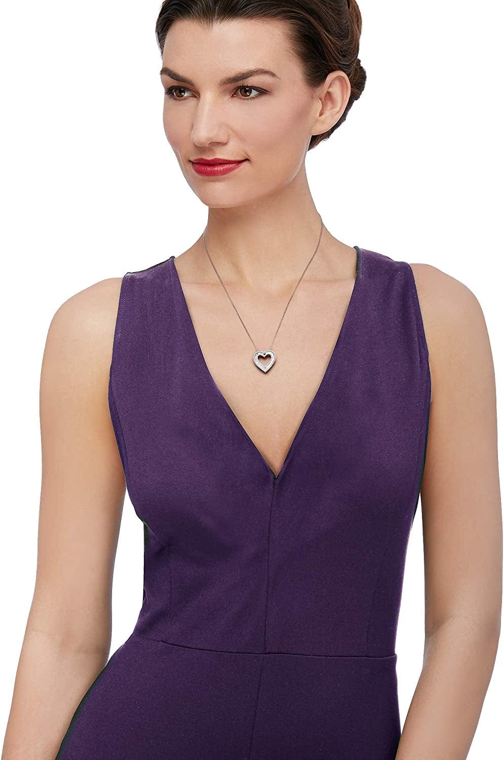 1.00 Ct. T.W. Baguette and round Diamond Heart Pendant Necklace in Sterling Silver