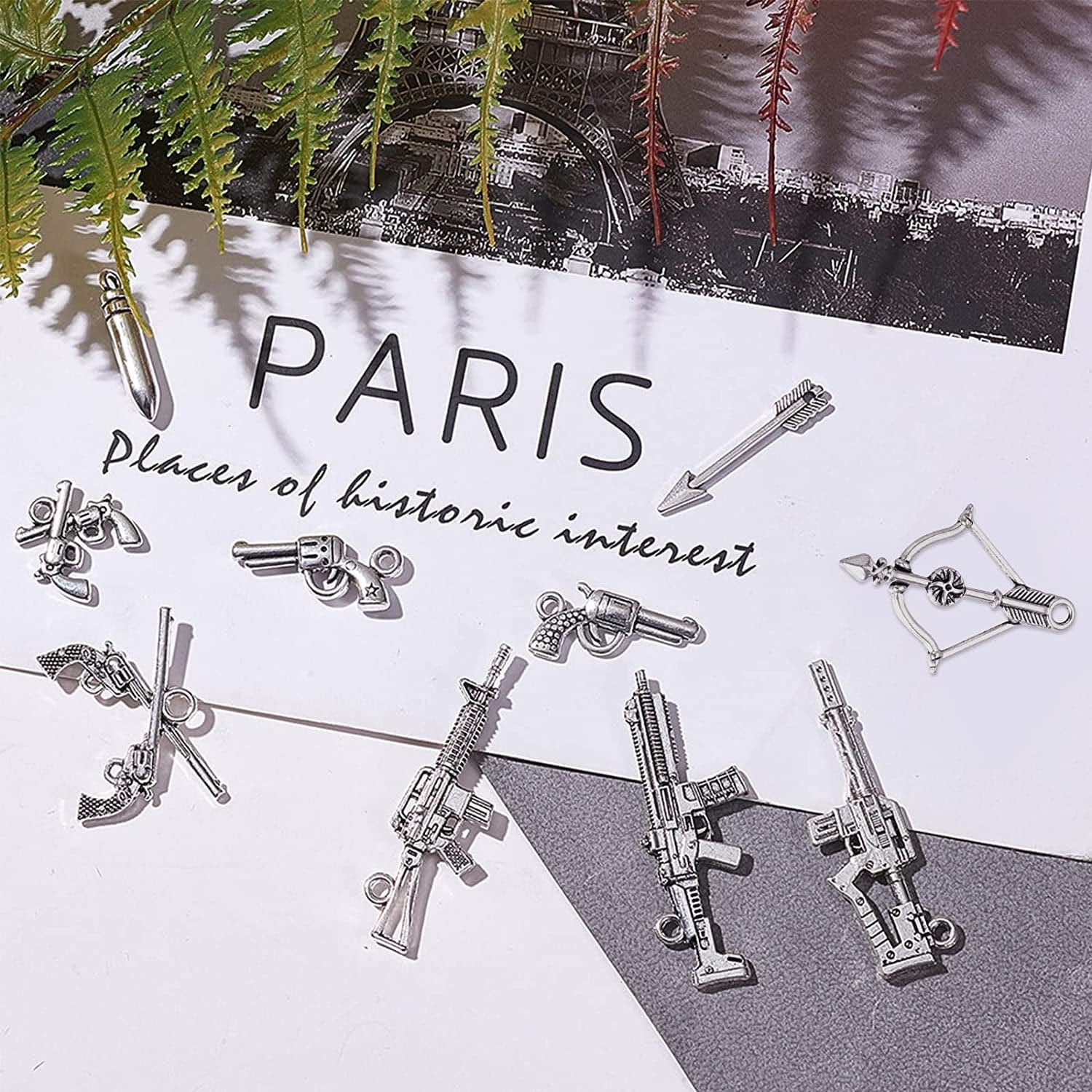 1 Box 40Pcs 10 Styles Gun Pistol Revolver Weapon Charms Pendants Craft Supplies Bow Arrow Charms Pendant for Jewelry Finding Making Accessory for DIY Bracelet