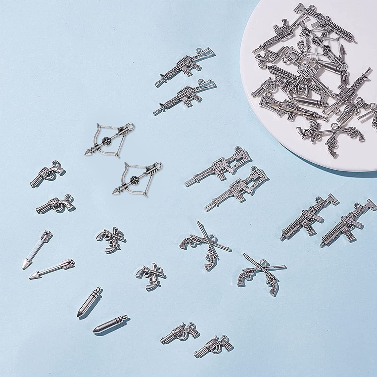 1 Box 40Pcs 10 Styles Gun Pistol Revolver Weapon Charms Pendants Craft Supplies Bow Arrow Charms Pendant for Jewelry Finding Making Accessory for DIY Bracelet