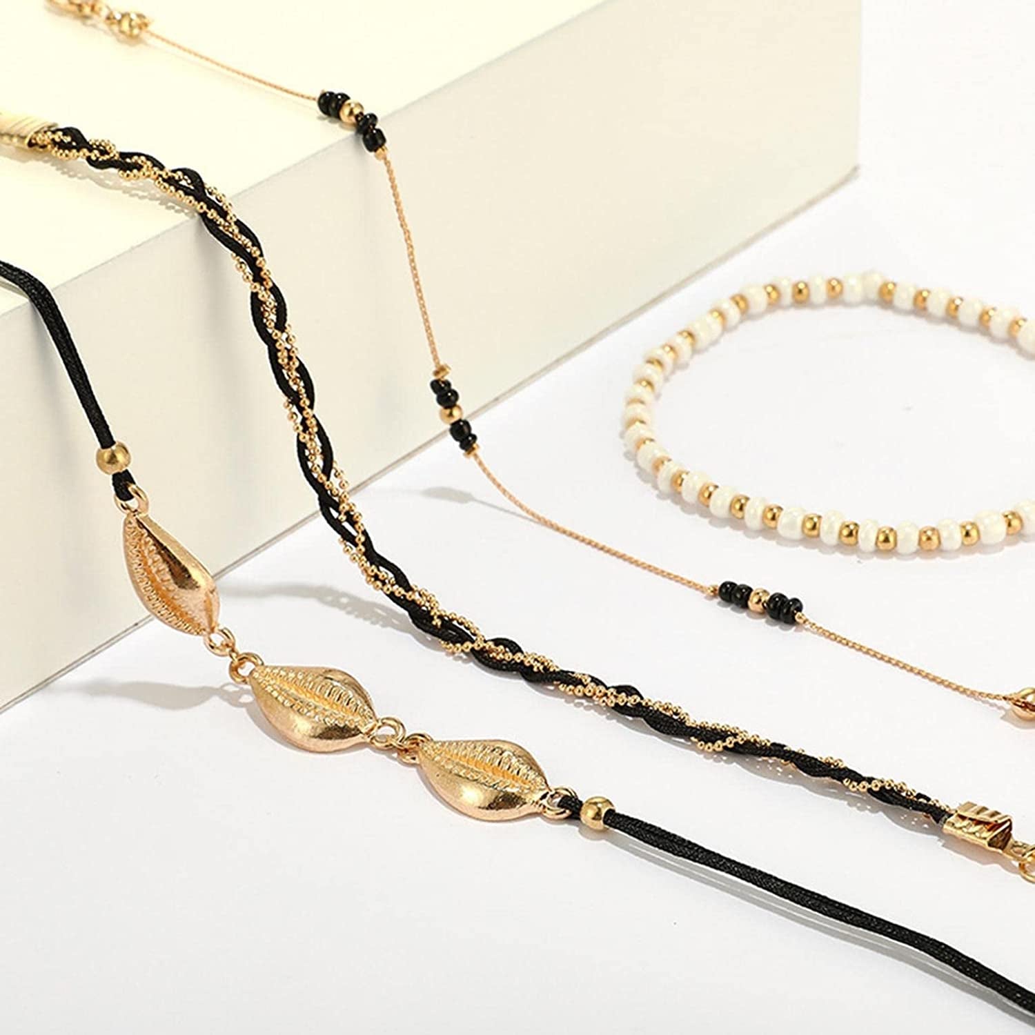 Bohemia Shell Charm Pendant Anklet Set, 4Pcs String Pearl Beaded Gold Ankle Bracelet, Beaded Foot Chain Beach Foot Jewelry Accessories for Women and Teen Girls Apparel & Accessories > Jewelry > Anklets Generic