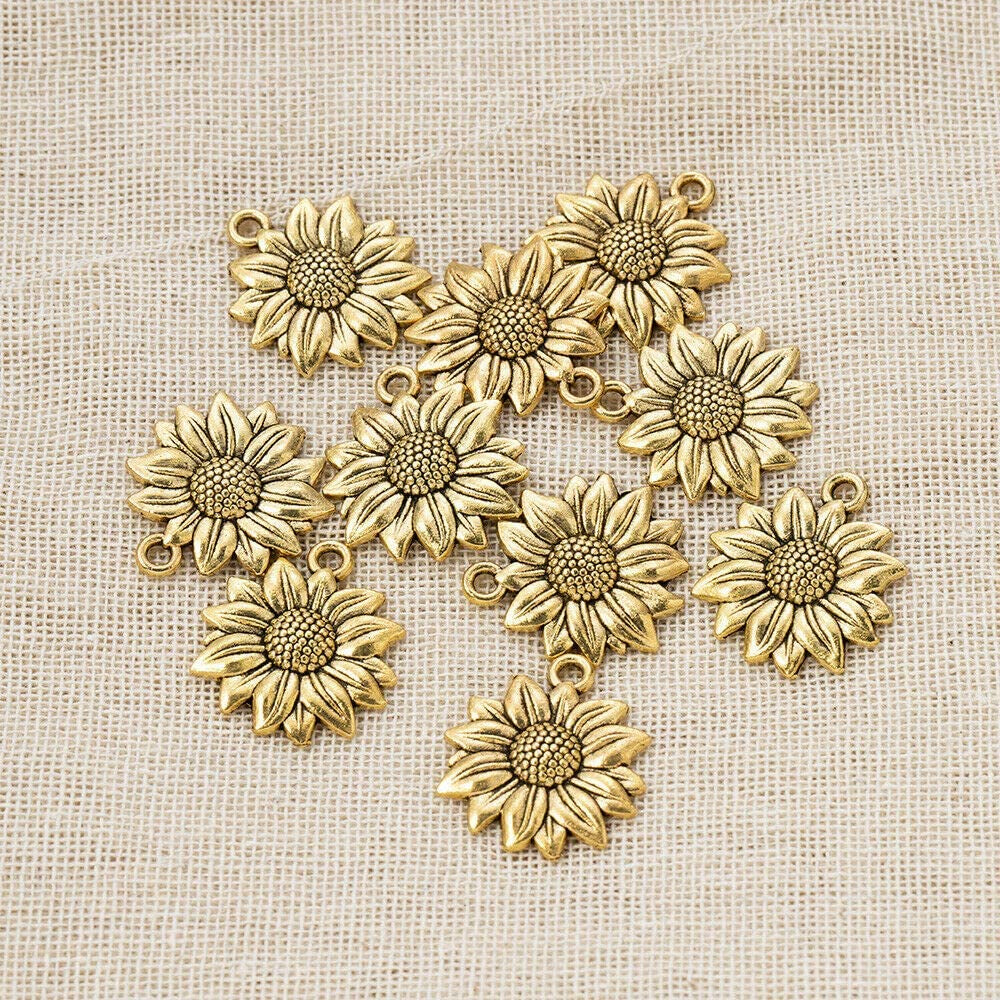 FHTDW 120 Pcs Sunflower Charms Pendant Vintage Antique Gold Alloy Pendant Bead for Jewelry Necklace Bracelet Making Supplies Apparel & Accessories > Jewelry > Charms & Pendants FHTDW