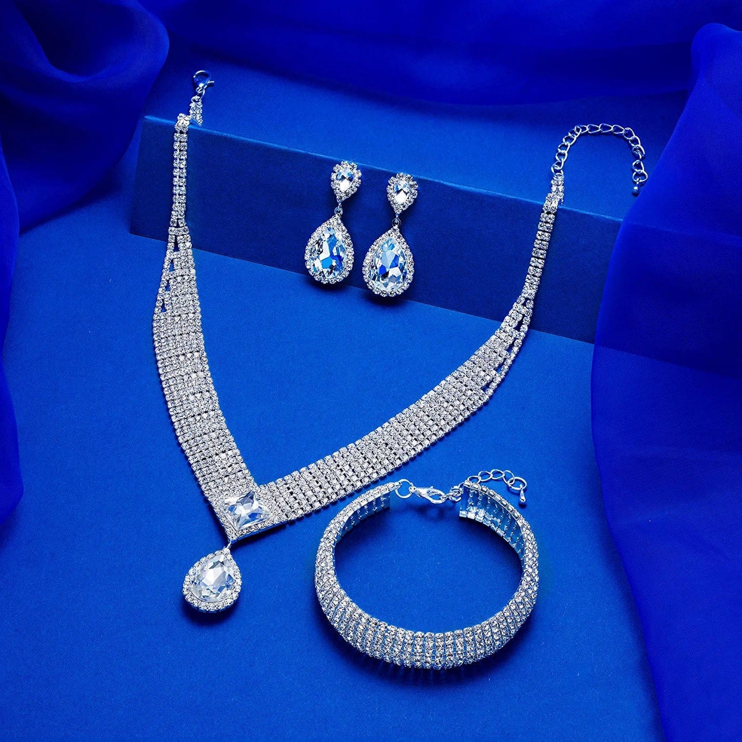 M MIRACULOUS GARDEN 3/4 Pieces Women Jewelry Set Rhinestone Tiara Crown Necklace Bangle Bracelet Crystal Teardrop Dangle Earrings and Rhinestone Handbag for Wedding Party