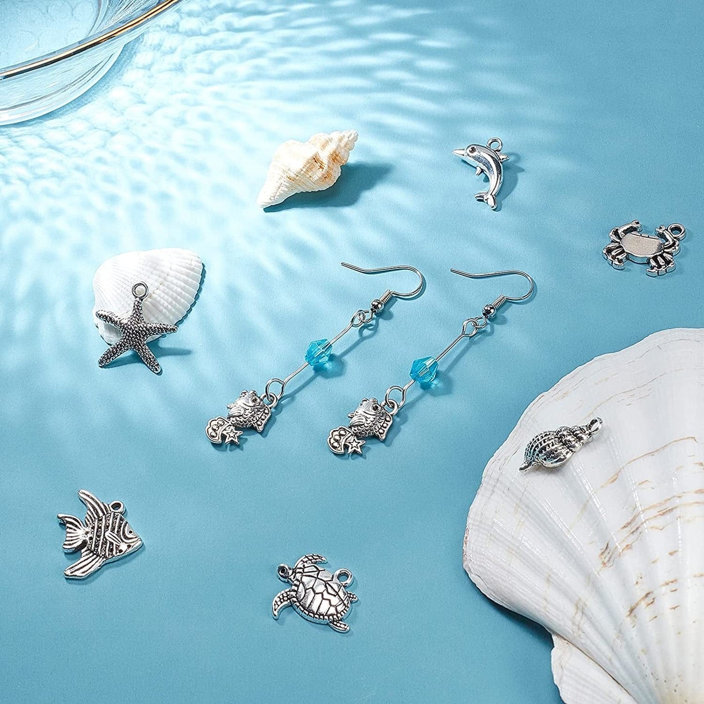 PH Pandahall 90Pcs 15 Style Ocean Fish Charms Tibetan Seashell Marine Pendants Antique Silver Animal Sea Creatures Charms Pendants for Wakiki Hawaii DIY Bracelet Necklace Keychain Jewelry Making