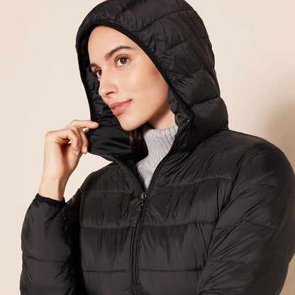 Lightweight puffer coat packed into compact carrying pouch