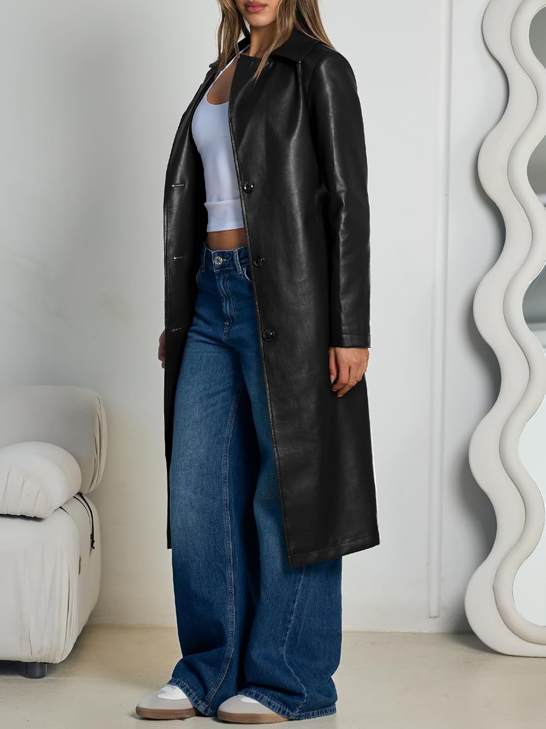 Open front faux leather jacket displaying structured silhouette
