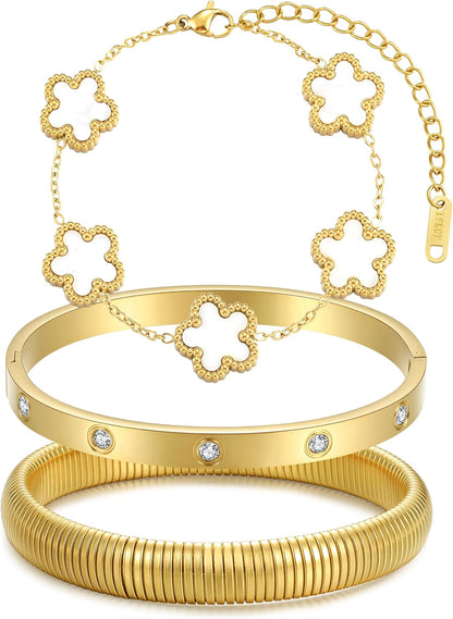 Shining gold bangle bracelets stacked on wrist