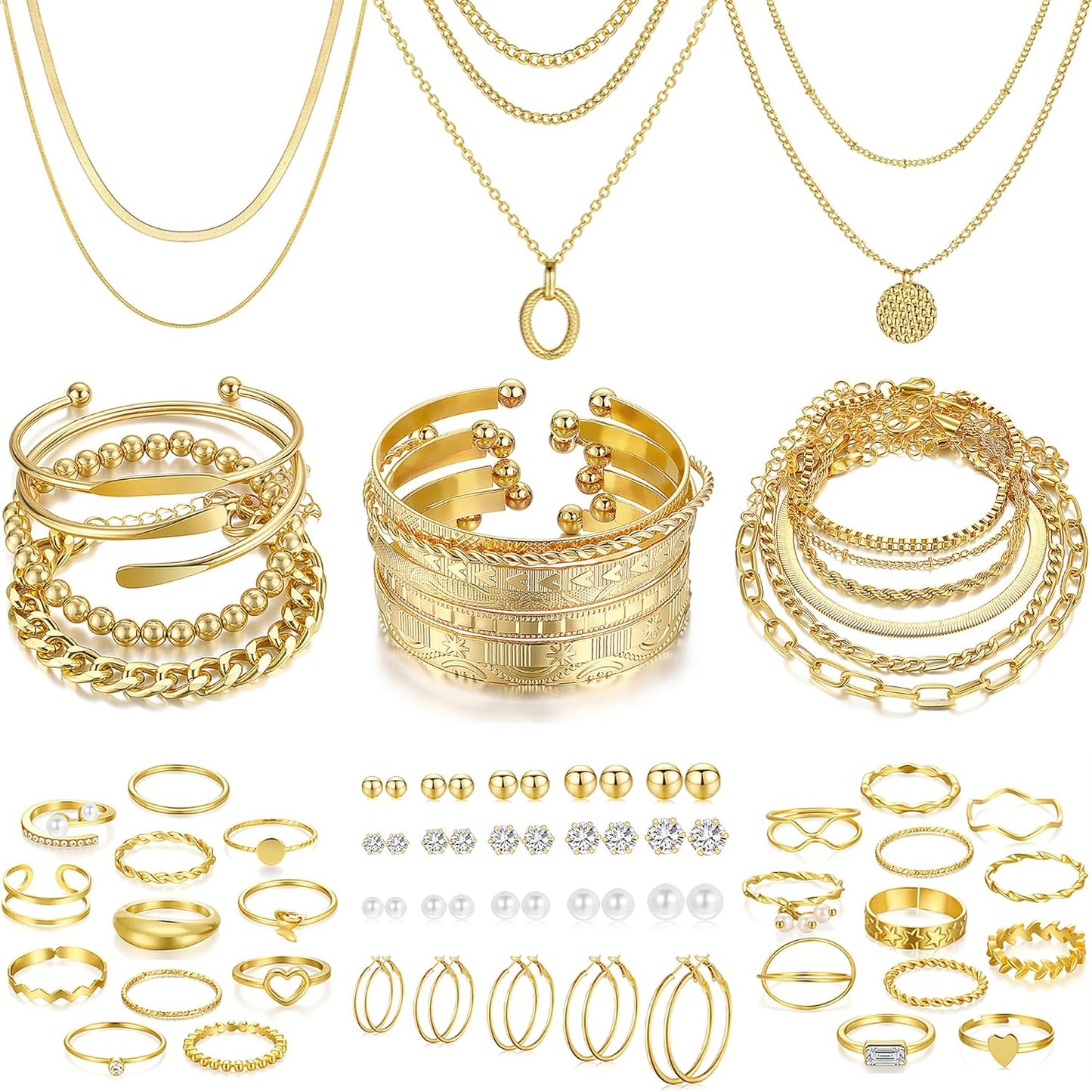 Gold bracelets and rings styled on woman's wrist and hand