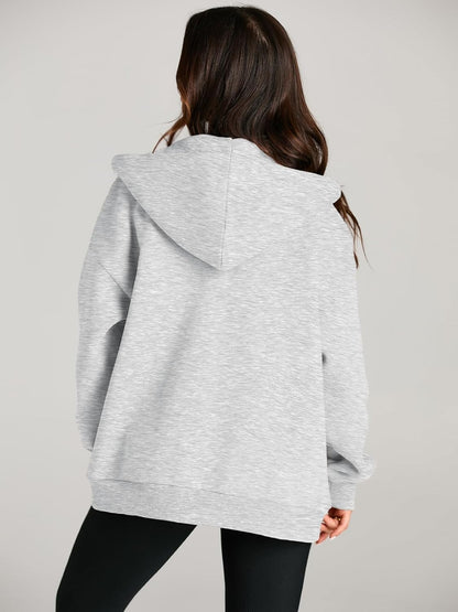 Side view of EFAN oversized hoodie with functional pocket placement