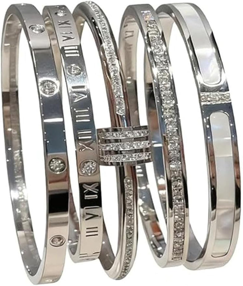Five-piece stainless steel bracelet set featuring gold and silver stackable bangles
