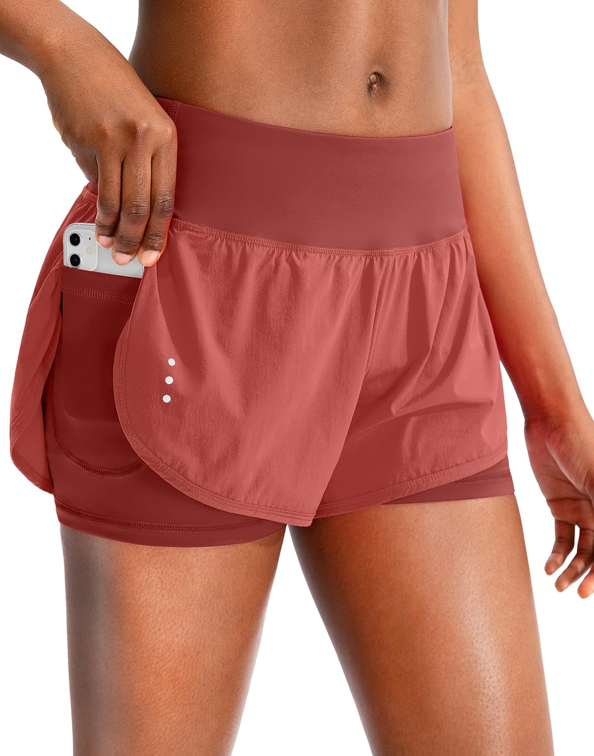 Woman wearing athletic spandex shorts for yoga practice
