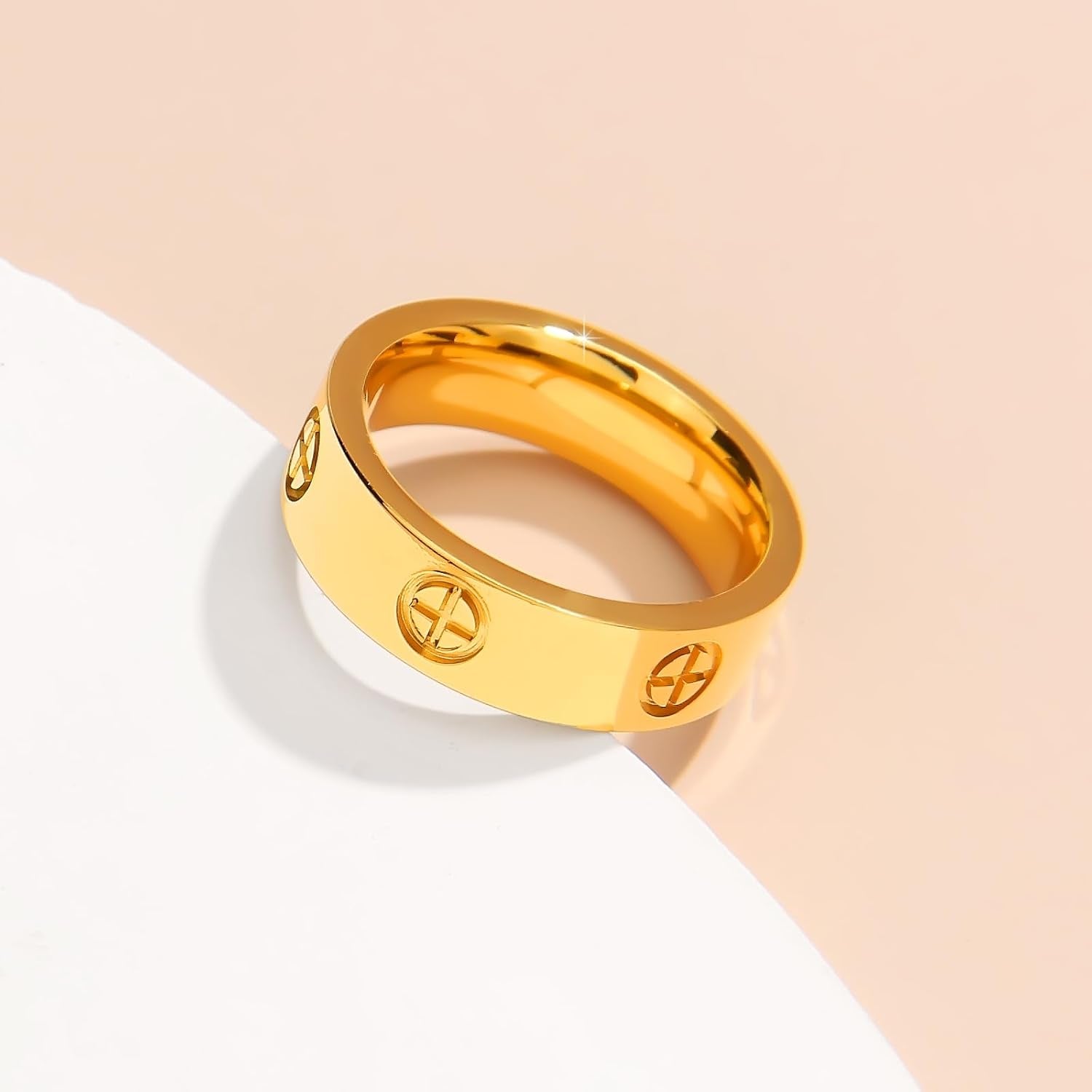 Love friendship gold ring displayed on woman's hand