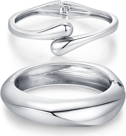 QPELL chunky gold plated bangle bracelets displayed on jewelry stand