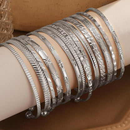 Side profile of non-tarnish gold charm bracelets on womans arm