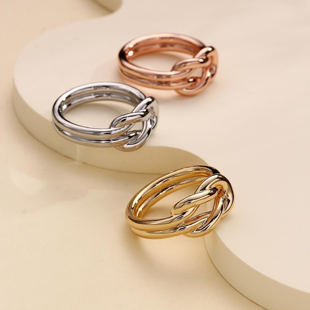 Dainty infinity knot brooch in gold tone finish