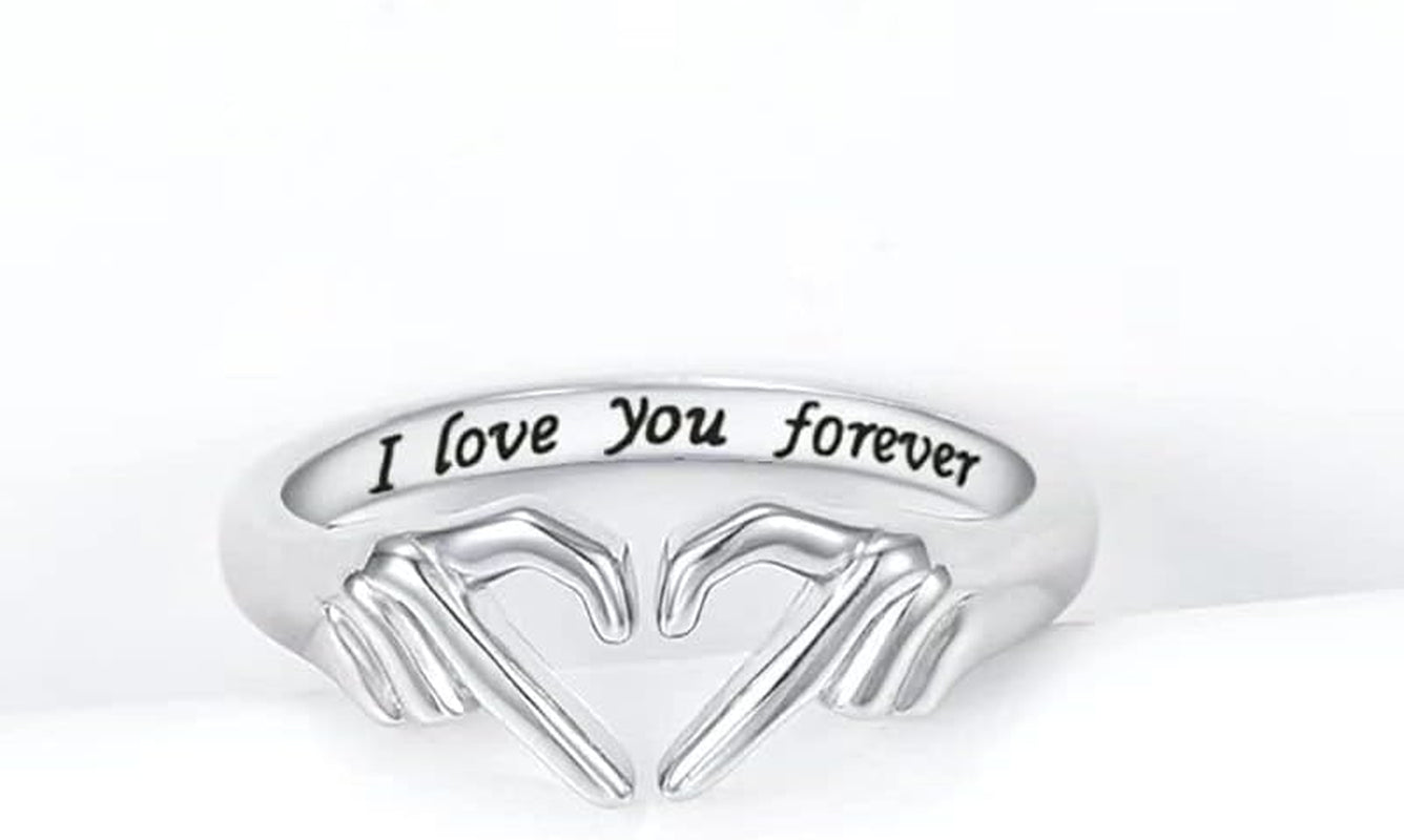 Silver friendship promise ring with heart and hug design