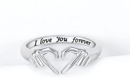 Silver friendship promise ring with heart and hug design