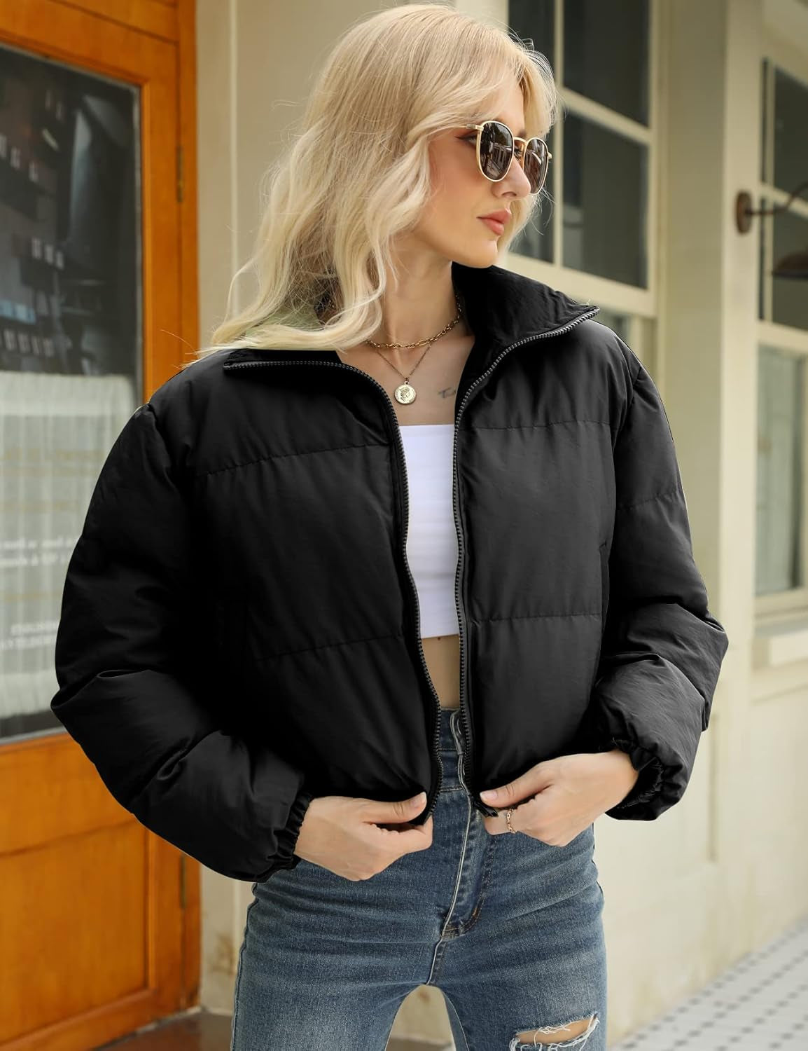 Side profile of cropped quilted jacket showing silhouette