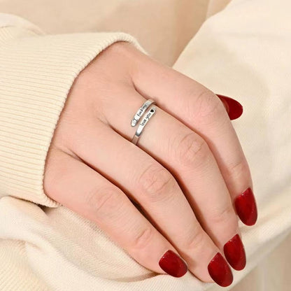 Stainless steel spiral wrap twist ring on hand showing fit