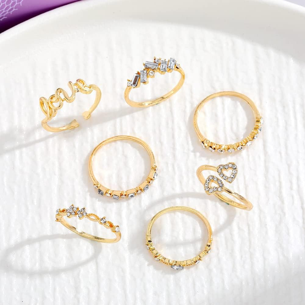 Trendy gold ring stack with moon and star charms