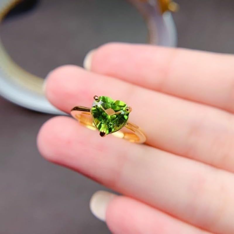 Sterling silver peridot ring displayed on ring holder