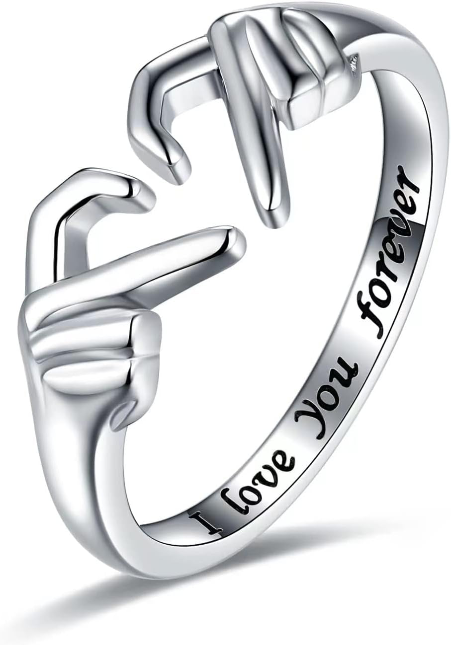 Heart hug ring with hugging hands design in silver