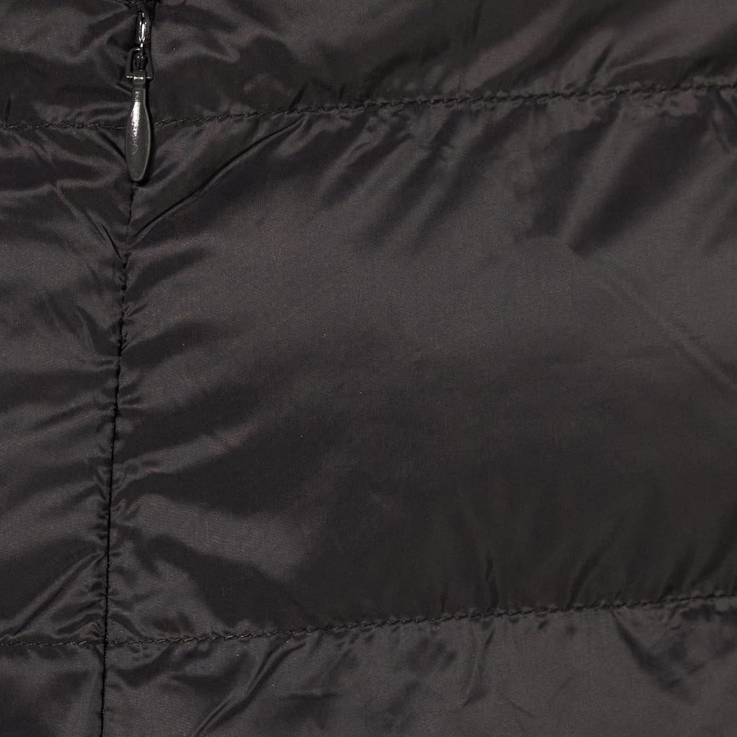 Detail view of quilted puffer material and stitching quality
