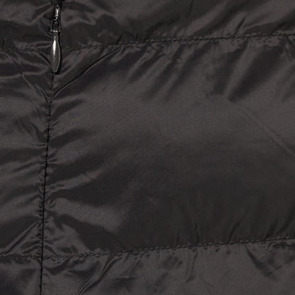 Detail view of quilted puffer material and stitching quality