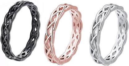 Woman wearing stacked Celtic knot rings on her hand