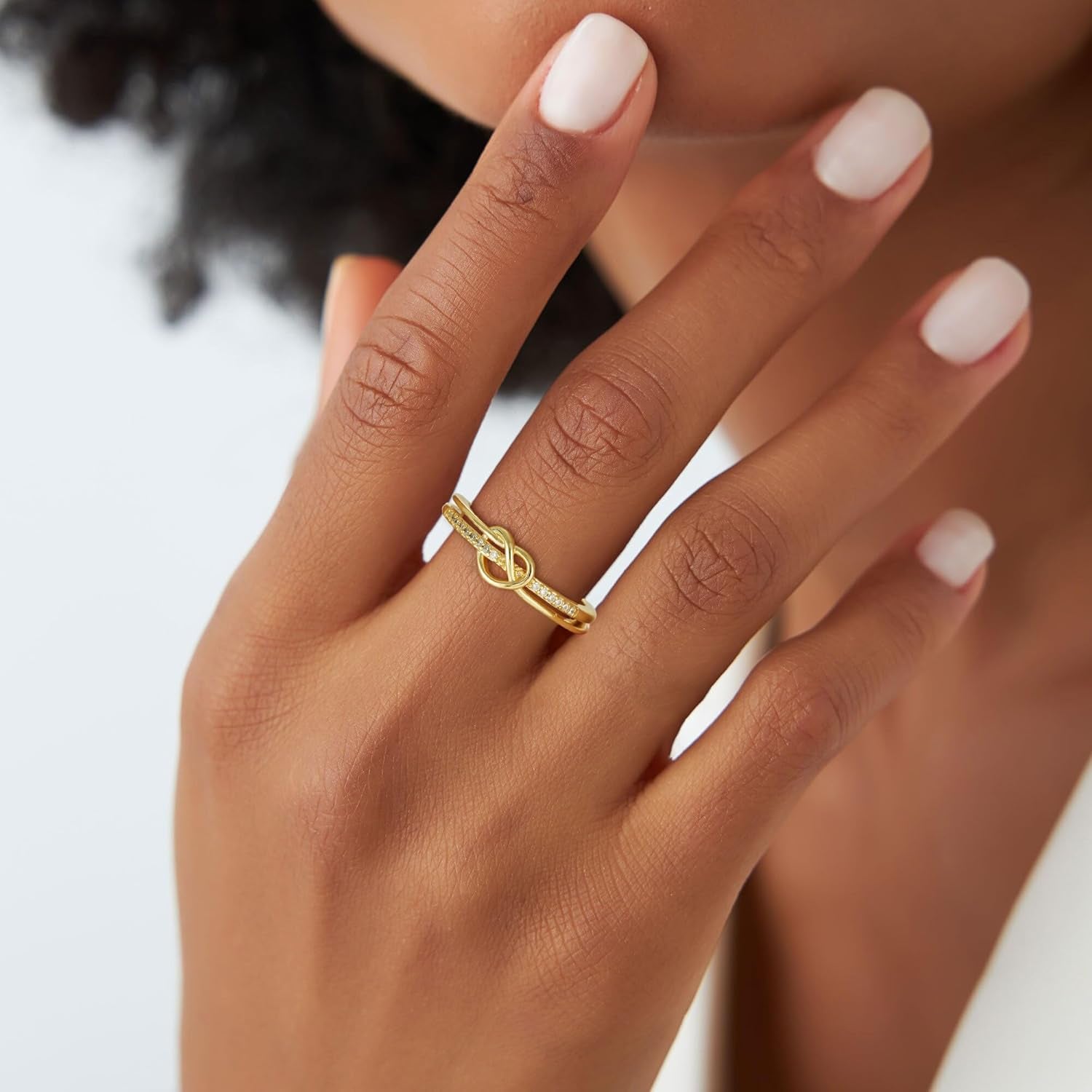 Close-up of cubic zirconia stone in 18K gold plated promise ring