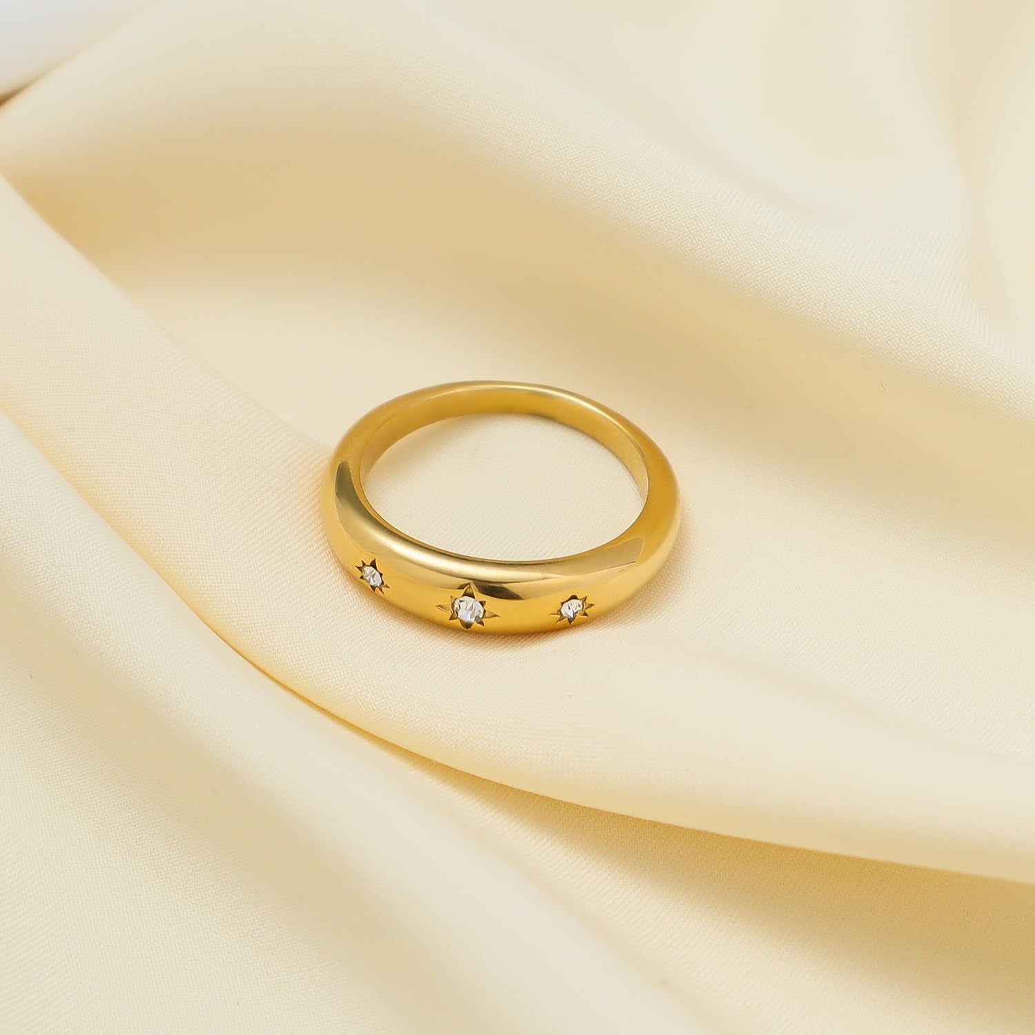 Multi-pack gold rings including star and promise band styles