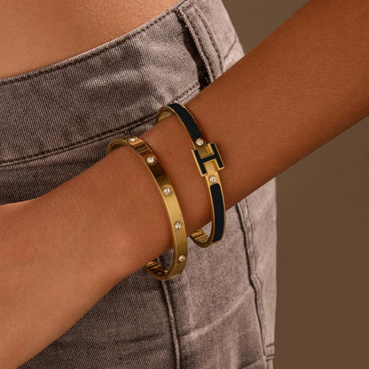 Women wearing gold plated love bracelet for everyday fashion