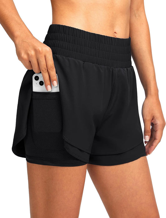 Woman wearing Soothfeel black 2-in-1 running shorts with high waisted fit during jog