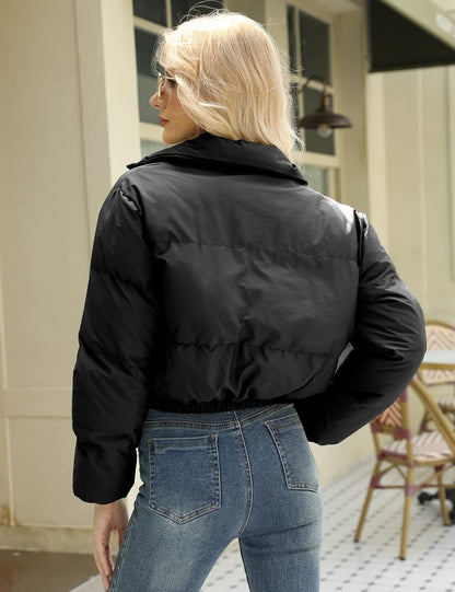 Back view of black quilted cropped winter jacket for women