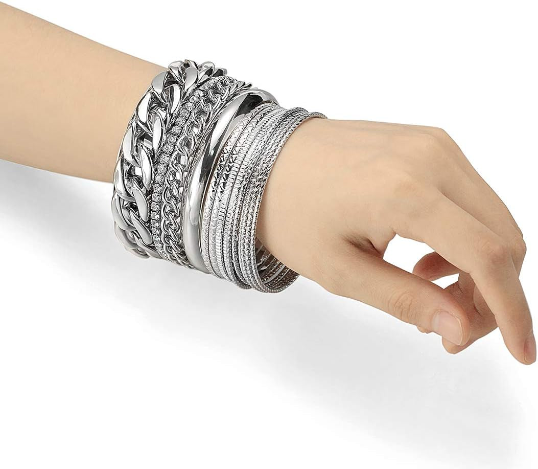 Multiple textured metal bangles with sparkling rhinestone details