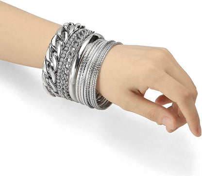 Multiple textured metal bangles with sparkling rhinestone details