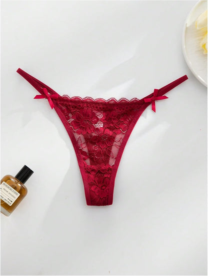 Breathable low rise thong panties with bow detail
