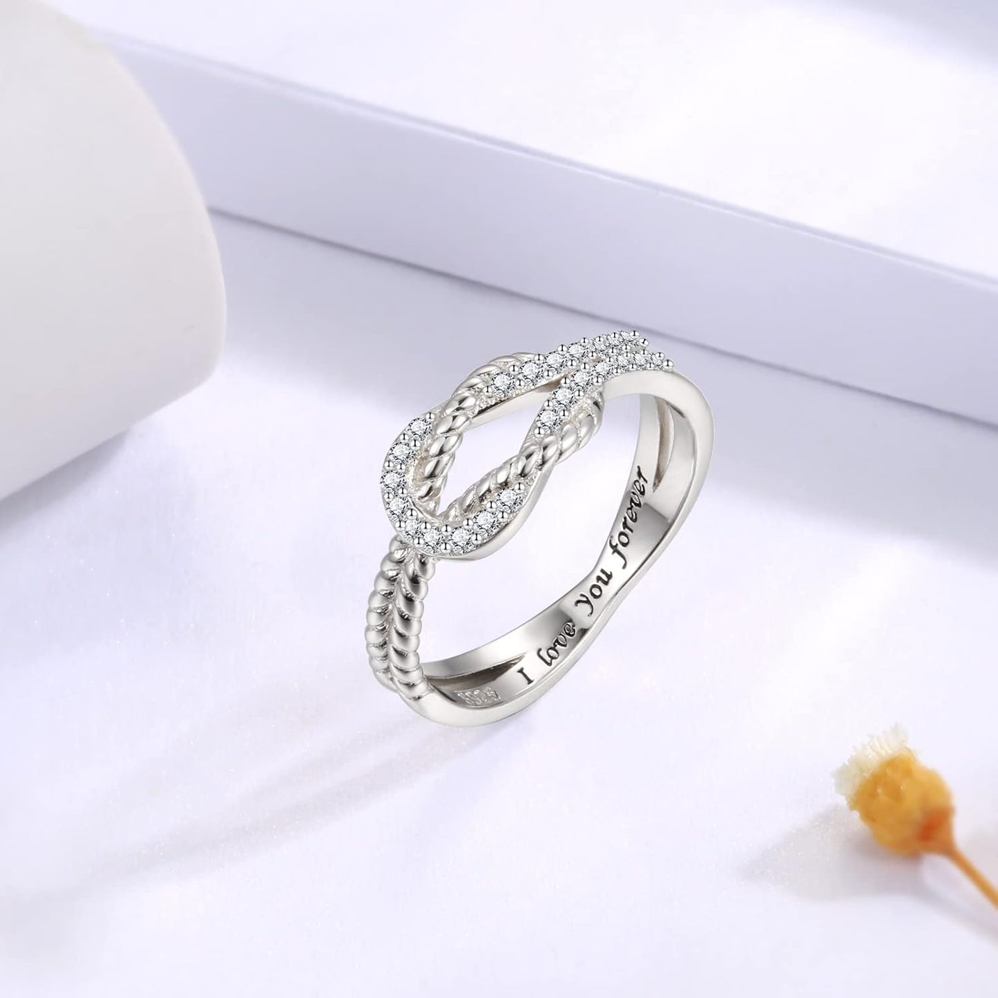 Close-up of intricate square knot pattern on ring