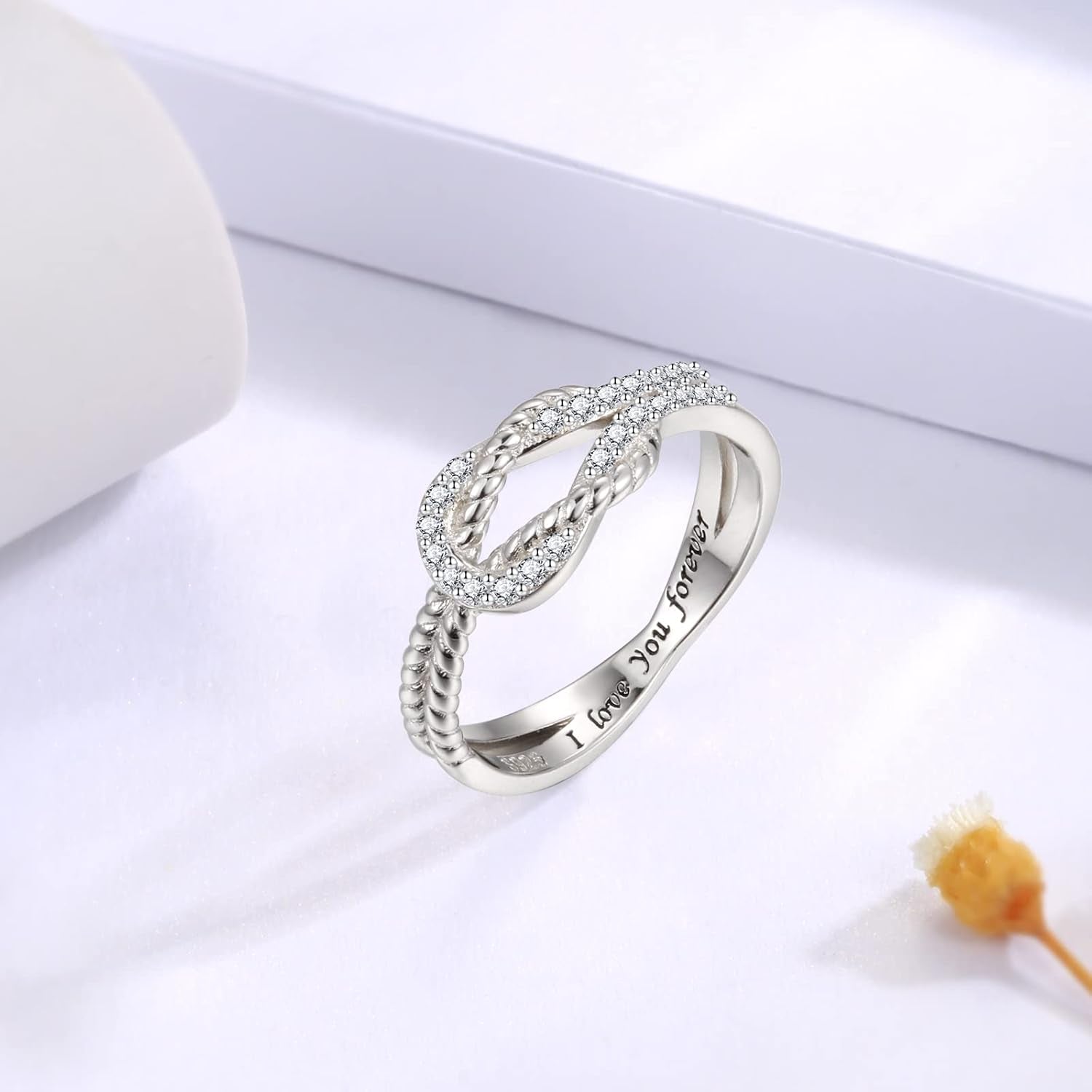 Close-up of intricate square knot pattern on ring