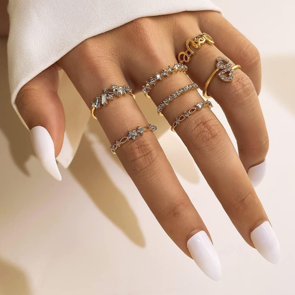 Boho dainty stacking rings displayed on multiple fingers