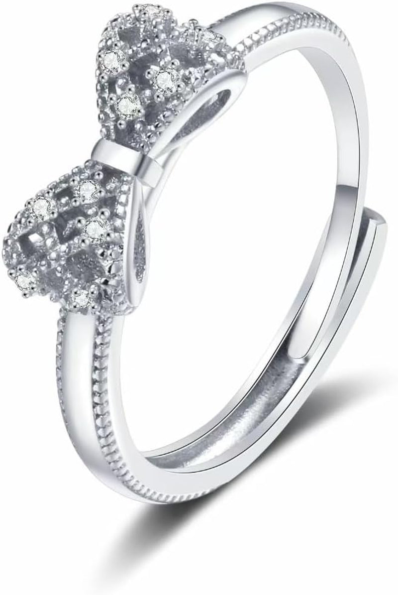 Cubic zirconia heart ring displaying intricate eternity bow details