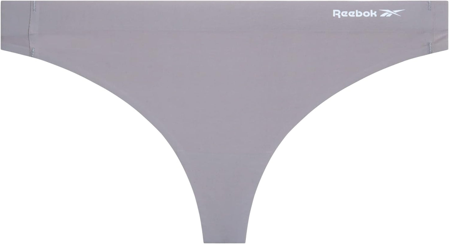 Women's performance thong panties in neutral tones