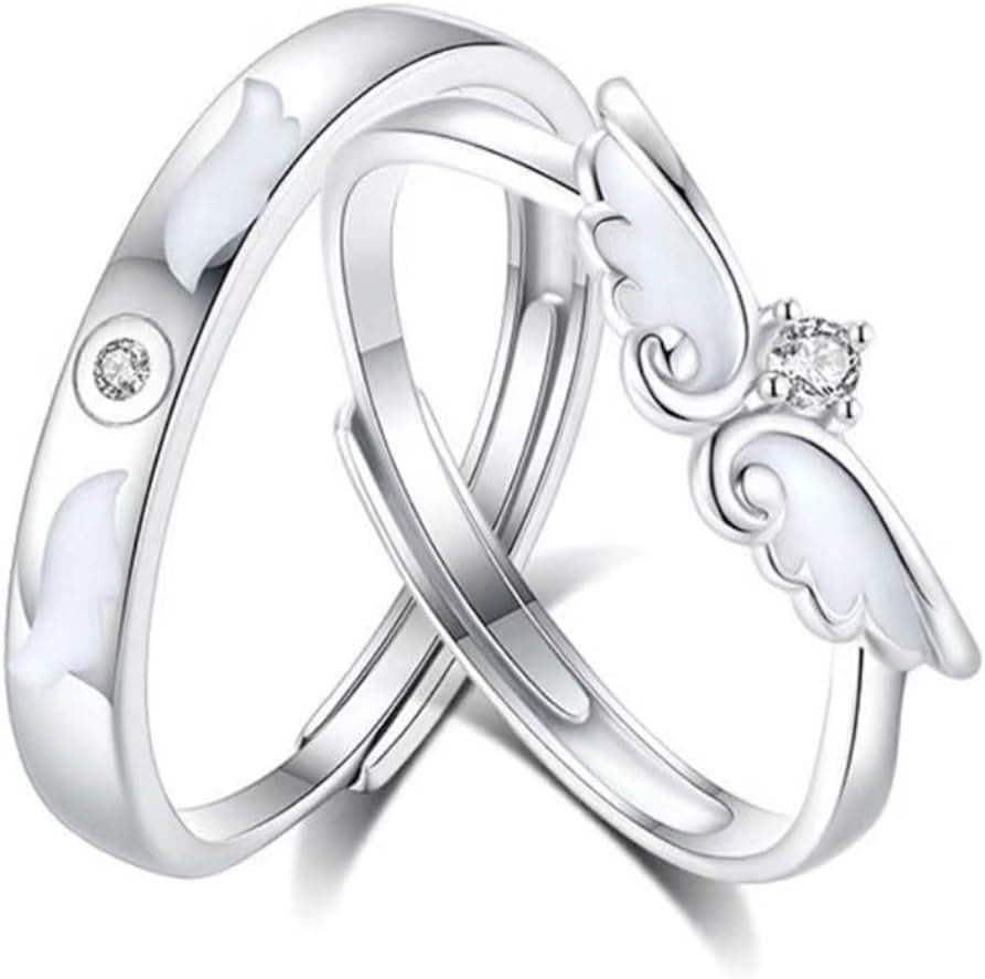 Couple holding hands wearing matching silver promise rings