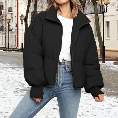 Woman wearing cropped puffer jacket casually