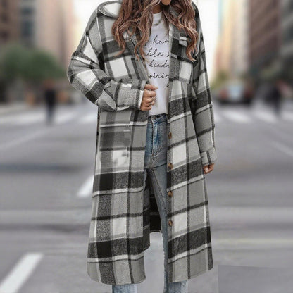 Woman wearing oversized plaid flannel shacket unbuttoned
