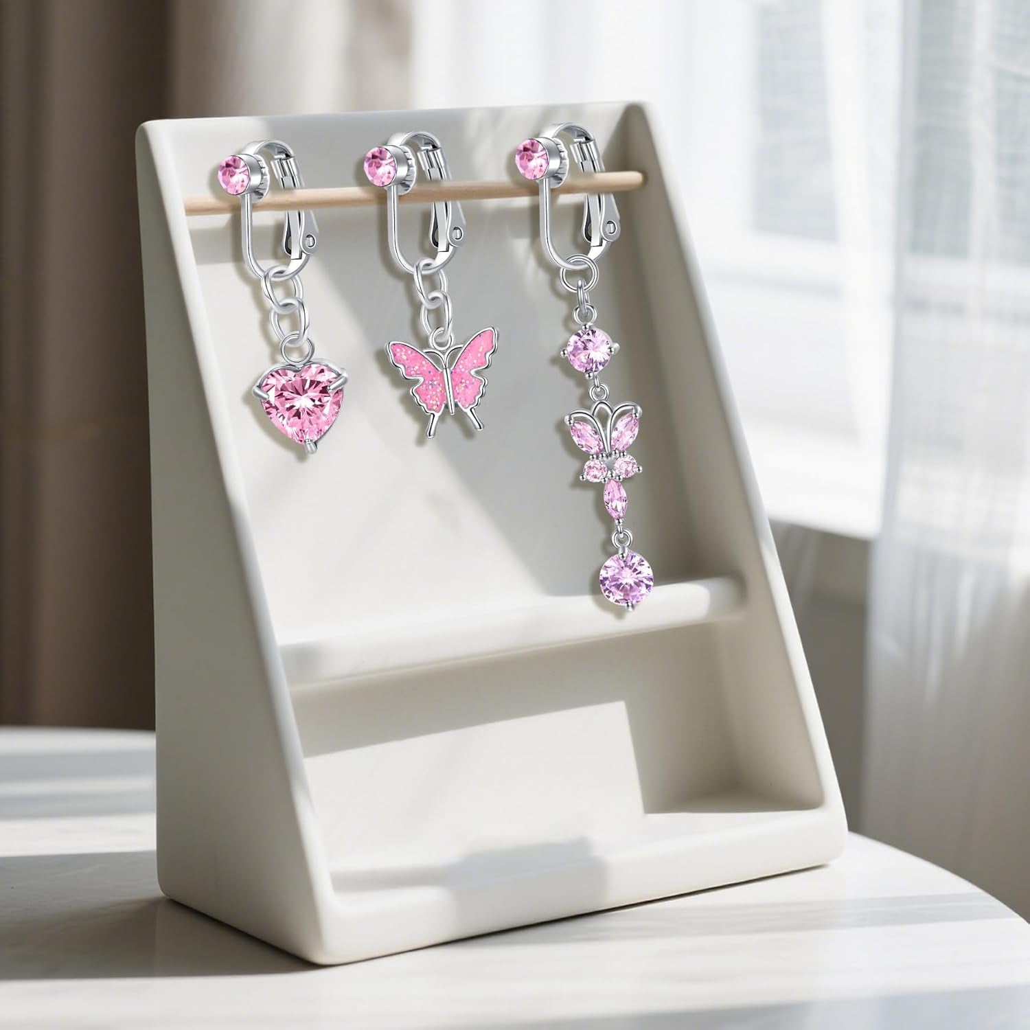 Fake belly ring clip-on earring detail and closure mechanism
