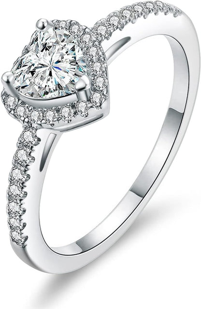 Elegant halo engagement ring in 18K gold with crystal stones