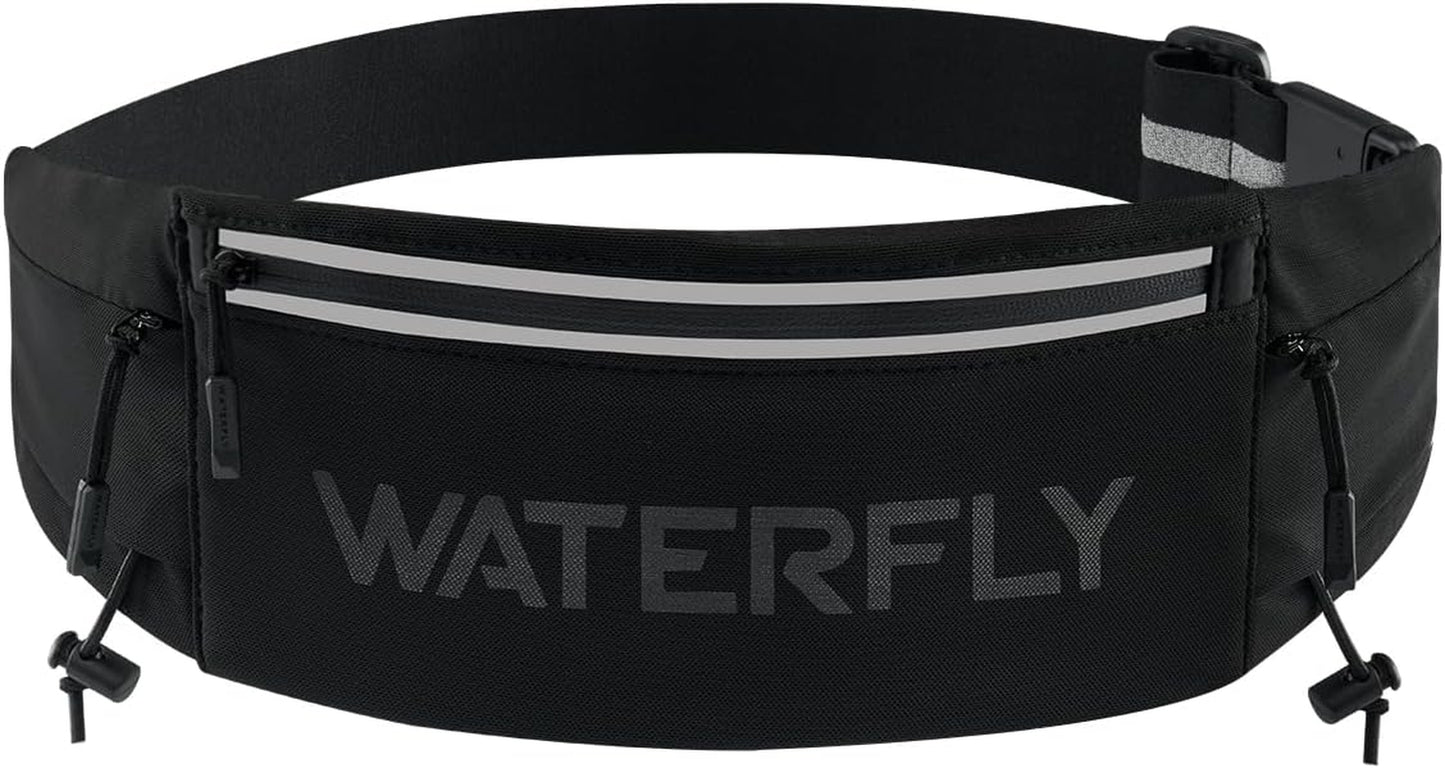 Woman wearing WATERFLY running belt fanny pack during outdoor marathon race